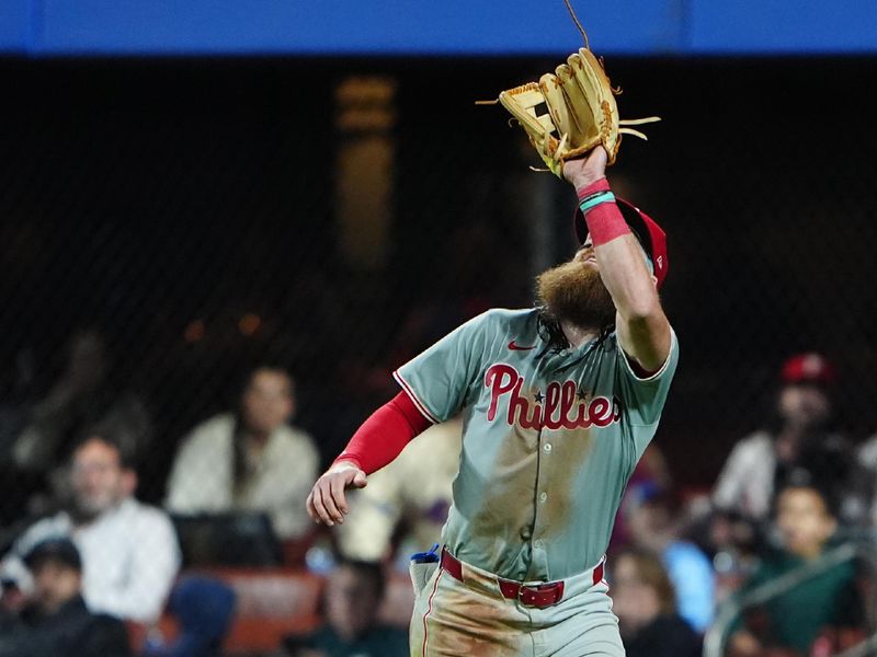 May 13, 2024; New York City, New York, USA; Philadelphia Phillies right fielder Brandon Marsh (16) catches a fly ball hit by New York Mets right fielder Starling Marte (not pictured) during the eighth inning at Citi Field. Mandatory Credit: Gregory Fisher-USA TODAY Sports