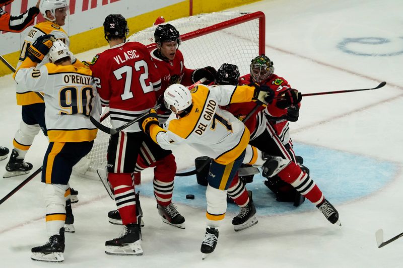 Oct 25, 2024; Chicago, Illinois, USA; The Chicago Blackhawks and the Nashville Predators get into a scrum during the second period at the United Center. Mandatory Credit: David Banks-Imagn Images