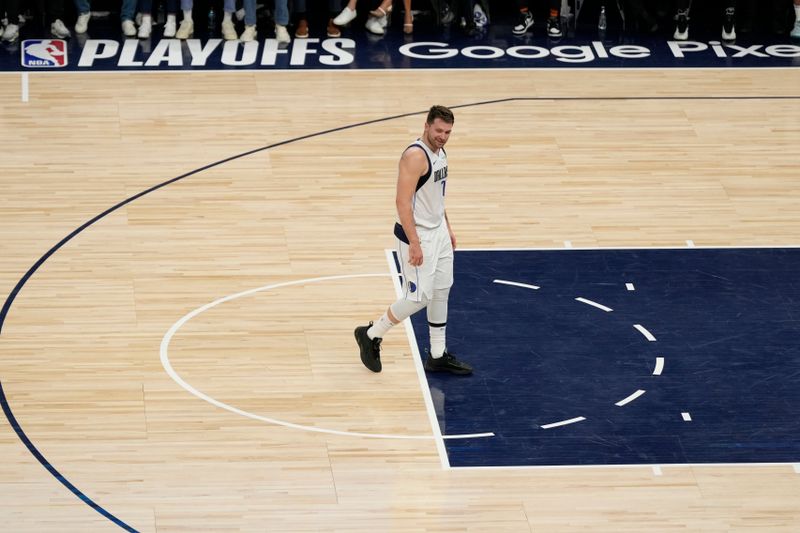 MINNEAPOLIS, MN - MAY 30:  Luka Doncic #77 of the Dallas Mavericks smiles during the game against the Minnesota Timberwolves during Game 5 of the Western Conference Finals of the 2024 NBA Playoffs on May 30, 2024 at Target Center in Minneapolis, Minnesota. NOTE TO USER: User expressly acknowledges and agrees that, by downloading and or using this Photograph, user is consenting to the terms and conditions of the Getty Images License Agreement. Mandatory Copyright Notice: Copyright 2024 NBAE (Photo by Jordan Johnson/NBAE via Getty Images)