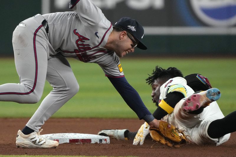 Apr 27, 2025; Phoenix, Arizona, USA; Arizona Diamondbacks shortstop Geraldo Perdomo (2) steals second under the tag by Atlanta Braves shortstop Nick Allen (2) in the seventh inning at Chase Field. Mandatory Credit: Rick Scuteri-Imagn Images