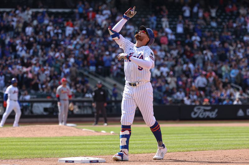 Apr 20, 2025; New York City, New York, USA; New York Mets left fielder Brandon Nimmo (9) reacts after hitting an RBI single during the seventh inning against the St. Louis Cardinals at Citi Field. Mandatory Credit: Vincent Carchietta-Imagn Images