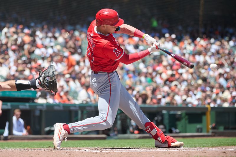 Jun 15, 2024; San Francisco, California, USA; Los Angeles Angels catcher Logan O'Hoppe (14) hits a single against the San Francisco Giants during the fourth inning at Oracle Park. Mandatory Credit: Robert Edwards-USA TODAY Sports