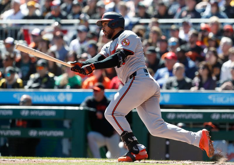 Apr 7, 2024; Pittsburgh, Pennsylvania, USA;  Baltimore Orioles right fielder Anthony Santander (25) hits an RBI single against the Pittsburgh Pirates during the fourth inning at PNC Park. Mandatory Credit: Charles LeClaire-USA TODAY Sports