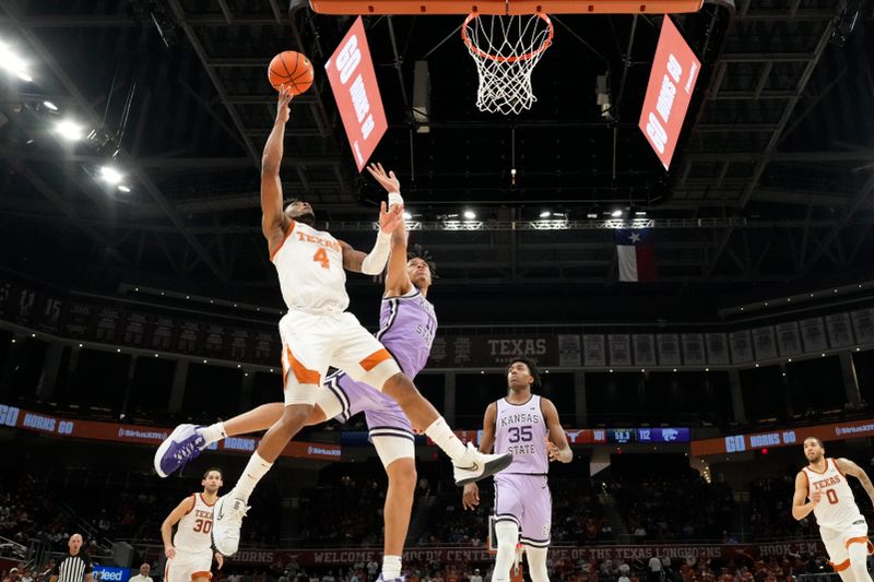 Jan 3, 2023; Austin, Texas, USA; Texas Longhorns guard Tyrese Hunter (4) shoots over Kansas State Wildcats forward Keyontae Johnson (11) during the second half at Moody Center. Mandatory Credit: Scott Wachter-USA TODAY Sports