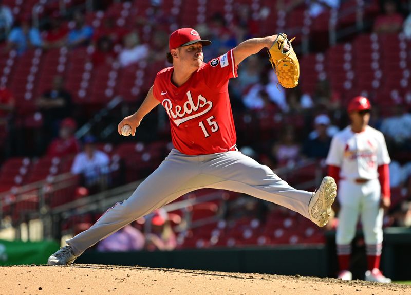 Sep 17, 2025; St. Louis, Missouri, USA; Cincinnati Reds pitcher Emilio Pagan (15) pitches in relief against the St. Louis Cardinals in the ninth inning at Busch Stadium. Mandatory Credit: Tim Vizer-Imagn Images
