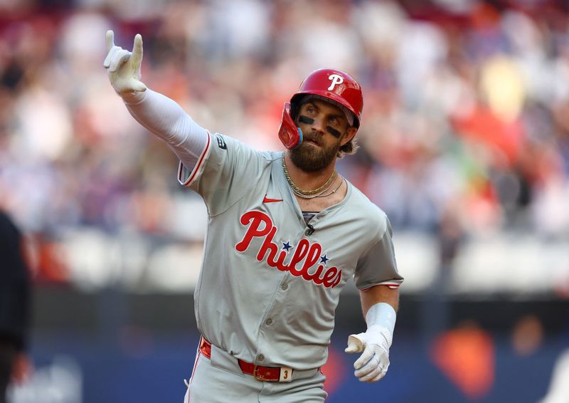 [US, Mexico & Canada customers only] June 8, 2024; London, UNITED KINGDOM;  Philadelphia Phillies player Bryce Harper celebrates after hitting a home run against the New York Mets during a London Series baseball game at Queen Elizabeth Olympic Park. Mandatory Credit: Matthew Childs/Reuters via USA TODAY Sports