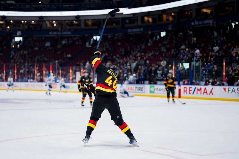 Dec 12, 2023; Vancouver, British Columbia, CAN; Vancouver Canucks forward Elias Pettersson (40) shoots during warm up prior to a game against the Tampa Bay Lightning at Rogers Arena. Mandatory Credit: Bob Frid-USA TODAY Sports