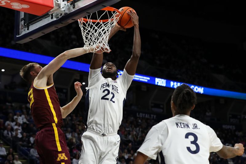 Jan 27, 2024; University Park, Pennsylvania, USA; Penn State Nittany Lions forward Qudus Wahab (22) is fouled by Minnesota Golden Gophers forward Parker Fox (23) during the first half at Bryce Jordan Center. Minnesota defeated Penn State 83-74. Mandatory Credit: Matthew O'Haren-USA TODAY Sports