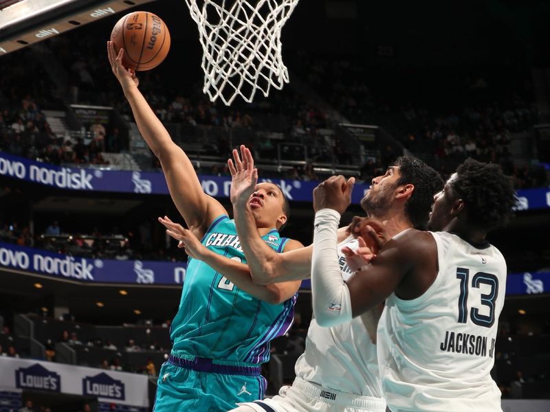 CHARLOTTE, NC - FEBRUARY 10:  Grant Williams #2 of the Charlotte Hornets goes to the basket during the game on February 10, 2024 at Spectrum Center in Charlotte, North Carolina. NOTE TO USER: User expressly acknowledges and agrees that, by downloading and or using this photograph, User is consenting to the terms and conditions of the Getty Images License Agreement.  Mandatory Copyright Notice:  Copyright 2024 NBAE (Photo by Kent Smith/NBAE via Getty Images)