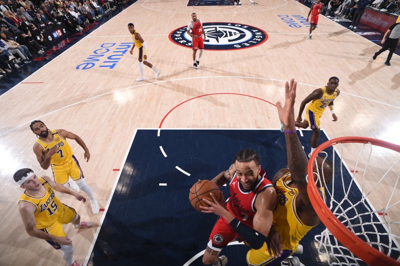 INGLEWOOD, CA - FEBRUARY 4: Amir Coffey #7 of the LA Clippers drives to the basket during the game against the Los Angeles Lakers on February 4, 2025 at Intuit Dome in Los Angeles, California. NOTE TO USER: User expressly acknowledges and agrees that, by downloading and/or using this Photograph, user is consenting to the terms and conditions of the Getty Images License Agreement. Mandatory Copyright Notice: Copyright 2025 NBAE (Photo by Juan Ocampo/NBAE via Getty Images)