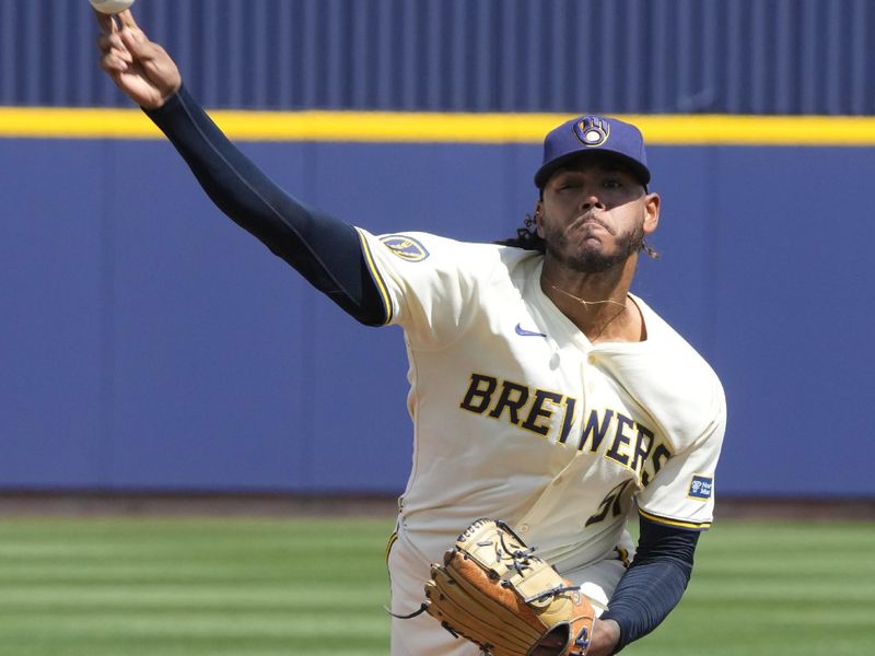 Mar 16, 2024; Phoenix, Arizona, USA; Milwaukee Brewers starting pitcher Freddy Peralta (51) throws against the Texas Rangers in the first inning at American Family Fields of Phoenix. Mandatory Credit: Rick Scuteri-USA TODAY Sports