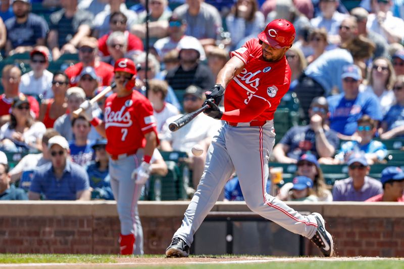 Jun 2, 2024; Chicago, Illinois, USA; Cincinnati Reds third baseman Jeimer Candelario (3) singles against the Chicago Cubs during the first inning at Wrigley Field. Mandatory Credit: Kamil Krzaczynski-USA TODAY Sports