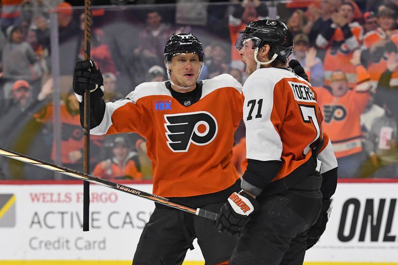 Nov 18, 2024; Philadelphia, Pennsylvania, USA; Philadelphia Flyers right wing Tyson Foerster (71) celebrates his goal with defenseman Erik Johnson (77) against the Colorado Avalanche during the third period at Wells Fargo Center. Mandatory Credit: Eric Hartline-Imagn Images