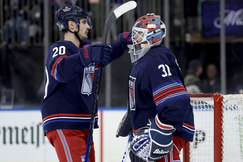 Jan 14, 2024; New York, New York, USA; New York Rangers left wing Chris Kreider (20) hugs goaltender Igor Shesterkin (31) after defeating the Washington Capitals at Madison Square Garden. Mandatory Credit: Brad Penner-USA TODAY Sports