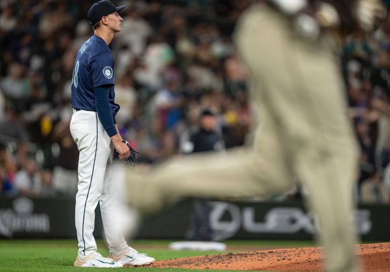 Sep 10, 2024; Seattle, Washington, USA;  Seattle Mariners starting pitcher George Kirby (68) reacts after giving up a two-run home run during the sixth inning against the San Diego Padres at T-Mobile Park. Mandatory Credit: Stephen Brashear-Imagn Images