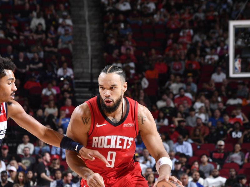 HOUSTON, TX - NOVEMBER 11: Dillon Brooks #9 of the Houston Rockets dribbles the ball during the game against the Washington Wizards on November 11, 2024 at the Toyota Center in Houston, Texas. NOTE TO USER: User expressly acknowledges and agrees that, by downloading and or using this photograph, User is consenting to the terms and conditions of the Getty Images License Agreement. Mandatory Copyright Notice: Copyright 2024 NBAE (Photo by Logan Riely/NBAE via Getty Images)