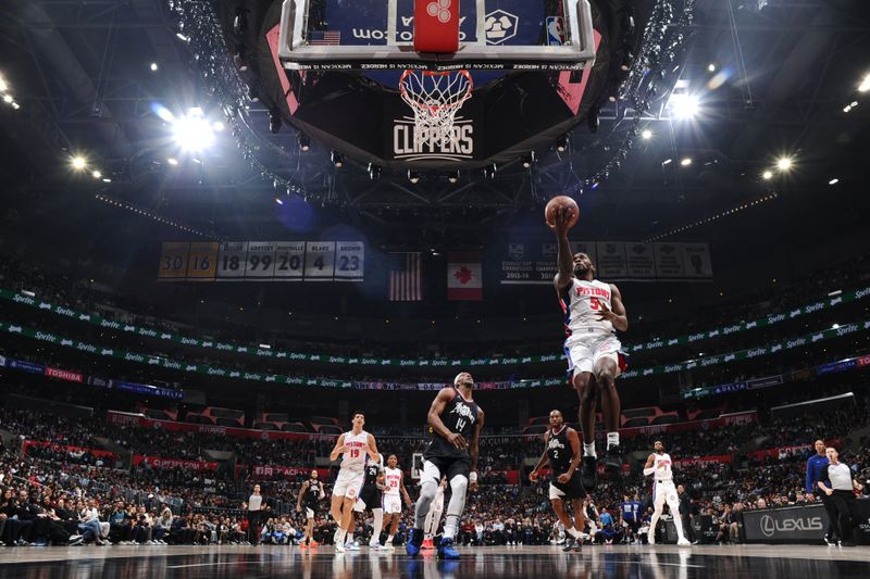 LOS ANGELES, CA - FEBRUARY 10:  Shake Milton #5 of the Detroit Pistons goes to the basket during the game on February 10, 2024 at Crypto.Com Arena in Los Angeles, California. NOTE TO USER: User expressly acknowledges and agrees that, by downloading and/or using this Photograph, user is consenting to the terms and conditions of the Getty Images License Agreement. Mandatory Copyright Notice: Copyright 2024 NBAE (Photo by Adam Pantozzi/NBAE via Getty Images)