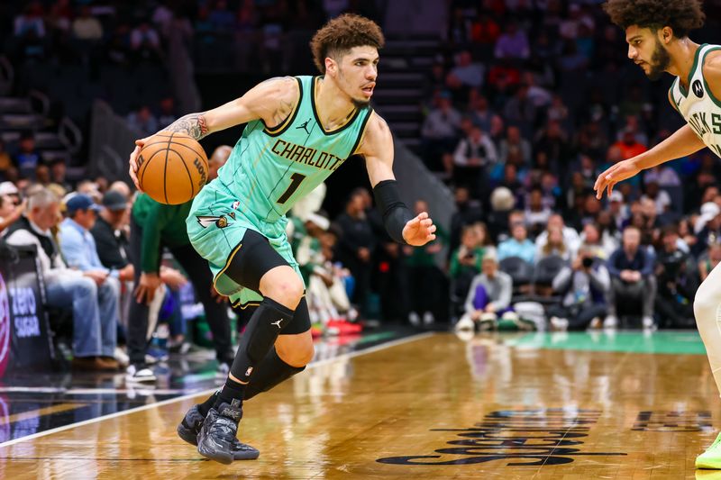 CHARLOTTE, NORTH CAROLINA - NOVEMBER 16: LaMelo Ball #1 of the Charlotte Hornets drives to the basket during the first half of a basketball game against the Milwaukee Bucks at Spectrum Center on November 16, 2024 in Charlotte, North Carolina. NOTE TO USER: User expressly acknowledges and agrees that, by downloading and or using this photograph, User is consenting to the terms and conditions of the Getty Images License Agreement. (Photo by David Jensen/Getty Images)