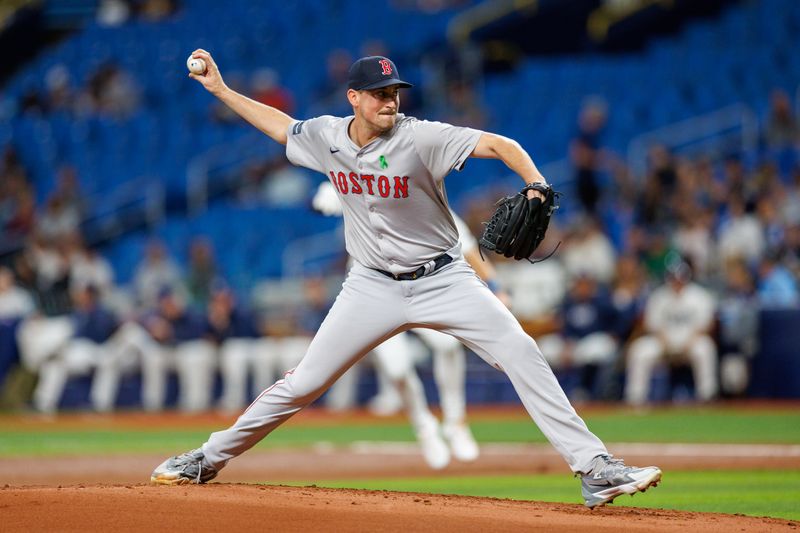 May 21, 2024; St. Petersburg, Florida, USA;  Boston Red Sox pitcher Cooper Criswell (64) throws a pitch against the Tampa Bay Rays in the first inning at Tropicana Field. Mandatory Credit: Nathan Ray Seebeck-USA TODAY Sports