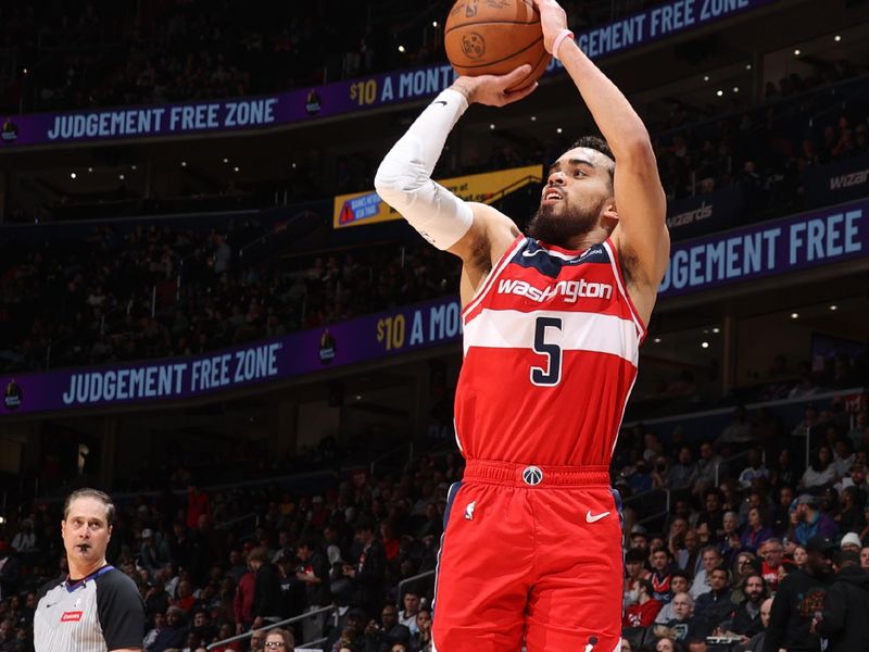 WASHINGTON, DC -? MARCH 8:  Tyus Jones #5 of the Washington Wizards shoots a 3-point basket during the game  on March 8, 2024 at Capital One Arena in Washington, DC. NOTE TO USER: User expressly acknowledges and agrees that, by downloading and or using this Photograph, user is consenting to the terms and conditions of the Getty Images License Agreement. Mandatory Copyright Notice: Copyright 2024 NBAE (Photo by Stephen Gosling/NBAE via Getty Images)