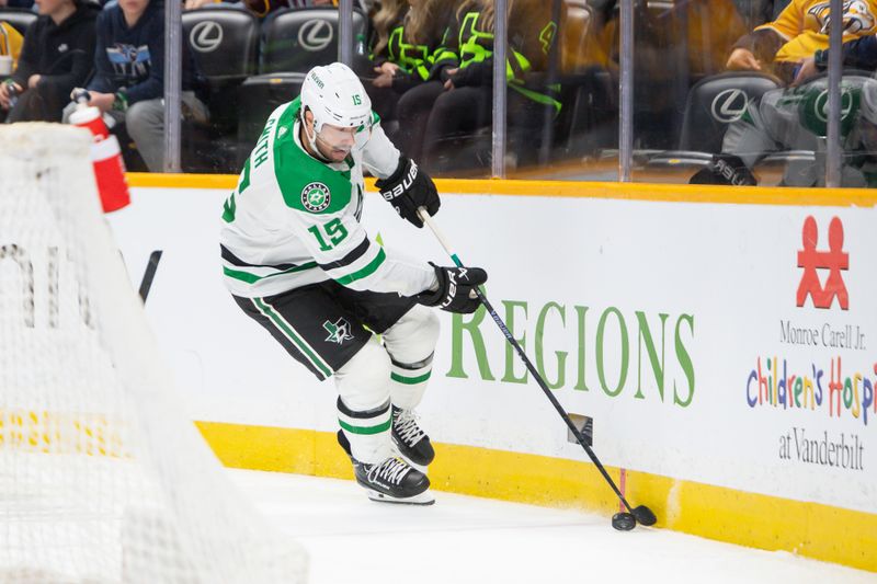 Feb 15, 2024; Nashville, Tennessee, USA; Dallas Stars center Craig Smith (15) skates with the puck  against the Nashville Predators during the second period at Bridgestone Arena. Mandatory Credit: Steve Roberts-USA TODAY Sports