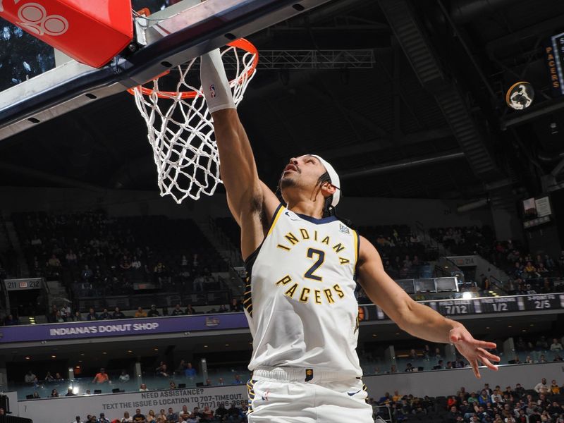 INDIANAPOLIS, IN - MARCH 18:  Andrew Nembhard #2 of the Indiana Pacers goes to the basket during the game on March 18, 2024 at Gainbridge Fieldhouse in Indianapolis, Indiana. NOTE TO USER: User expressly acknowledges and agrees that, by downloading and or using this Photograph, user is consenting to the terms and conditions of the Getty Images License Agreement. Mandatory Copyright Notice: Copyright 2024 NBAE (Photo by Ron Hoskins/NBAE via Getty Images)