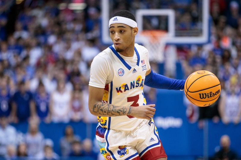 Feb 18, 2023; Lawrence, Kansas, USA; Kansas Jayhawks guard Dajuan Harris Jr. (3) sets a play against the Baylor Bears during the second half at Allen Fieldhouse. Mandatory Credit: William Purnell-USA TODAY Sports