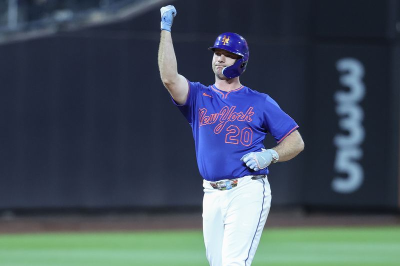 Jun 26, 2025; New York City, New York, USA;  New York Mets first baseman Pete Alonso (20) gestures after hitting a double in the seventh inning against the Atlanta Braves at Citi Field. Mandatory Credit: Wendell Cruz-Imagn Images