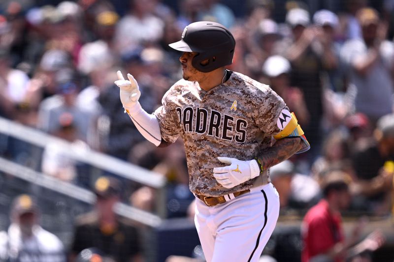 Sep 3, 2023; San Diego, California, USA; San Diego Padres designated hitter Manny Machado (13) celebrates after hitting a home run against the San Francisco Giants during the third inning at Petco Park. Mandatory Credit: Orlando Ramirez-USA TODAY Sports