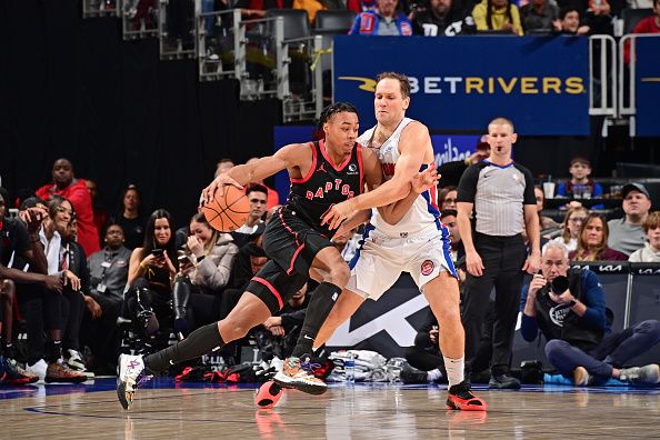 DETROIT, MI - DECEMBER 30: Scottie Barnes #4 of the Toronto Raptors dribbles the ball during the game against the Detroit Pistons on December 30, 2023 at Little Caesars Arena in Detroit, Michigan. NOTE TO USER: User expressly acknowledges and agrees that, by downloading and/or using this photograph, User is consenting to the terms and conditions of the Getty Images License Agreement. Mandatory Copyright Notice: Copyright 2023 NBAE (Photo by Chris Schwegler/NBAE via Getty Images)