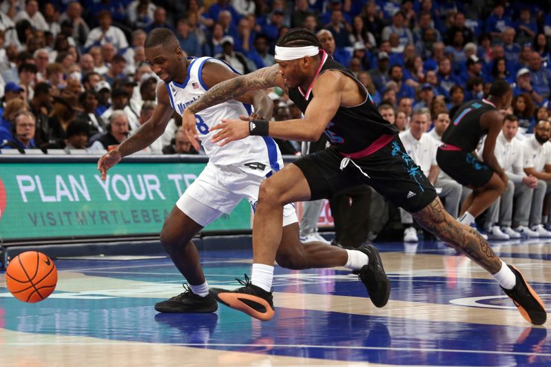 Feb 25, 2024; Memphis, Tennessee, USA; Memphis Tigers forward David Jones (8) and Florida Atlantic Owls guard Alijah Martin (15) battle for a loose ball during the first half  at FedExForum. Mandatory Credit: Petre Thomas-USA TODAY Sports