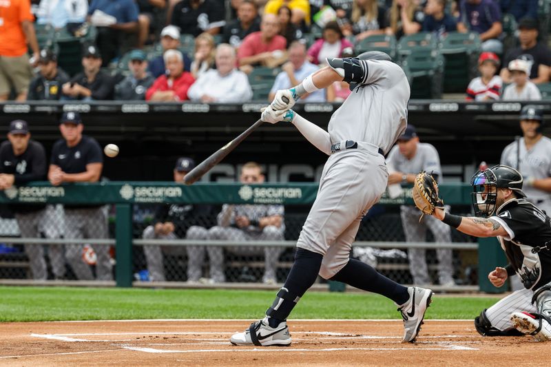 Aug 9, 2023; Chicago, Illinois, USA; New York Yankees right fielder Aaron Judge (99) singles against the Chicago White Sox during the first inning at Guaranteed Rate Field. Mandatory Credit: Kamil Krzaczynski-USA TODAY Sports