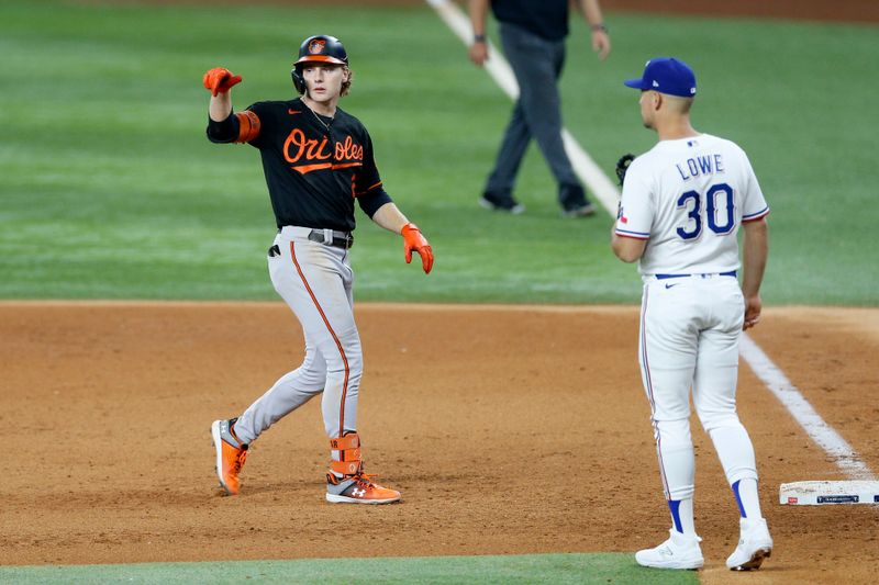 Oct 10, 2023; Arlington, Texas, USA; Baltimore Orioles third baseman Gunnar Henderson (2) reacts on first after hitting a single in the eighth inning against the Texas Rangers during game three of the ALDS for the 2023 MLB playoffs at Globe Life Field. Mandatory Credit: Andrew Dieb-USA TODAY Sports