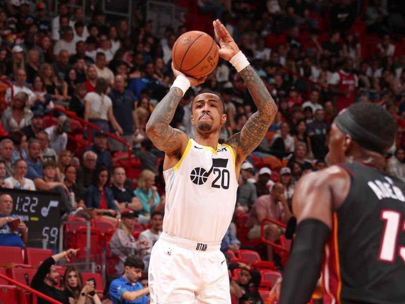 MIAMI, FL - MARCH 2: John Collins #20 of the Utah Jazz three point basket during the game against the Miami Heat on March 2, 2024 at Kaseya Center in Miami, Florida. NOTE TO USER: User expressly acknowledges and agrees that, by downloading and or using this Photograph, user is consenting to the terms and conditions of the Getty Images License Agreement. Mandatory Copyright Notice: Copyright 2024 NBAE (Photo by Issac Baldizon/NBAE via Getty Images)