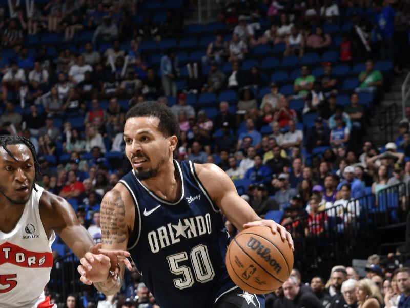 ORLANDO, FL - MARCH 17: Cole Anthony #50 of the Orlando Magic shoots the ball during the game against the Toronto Raptors on March 17, 2024 at the Kia Center in Orlando, Florida. NOTE TO USER: User expressly acknowledges and agrees that, by downloading and or using this photograph, User is consenting to the terms and conditions of the Getty Images License Agreement. Mandatory Copyright Notice: Copyright 2024 NBAE (Photo by Fernando Medina/NBAE via Getty Images)