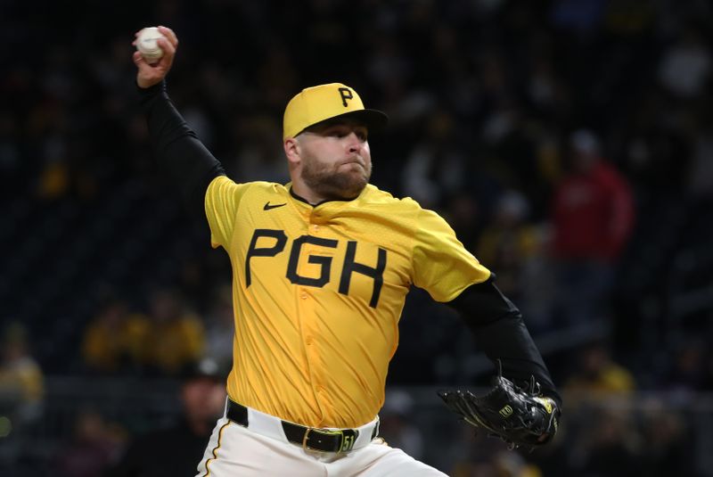 May 23, 2025; Pittsburgh, Pennsylvania, USA;  Pittsburgh Pirates relief pitcher David Bednar (51) pitches against the Milwaukee Brewers during the ninth inning at PNC Park. Mandatory Credit: Charles LeClaire-Imagn Images
