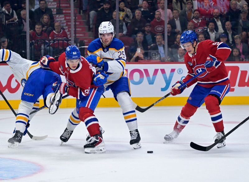 Oct 20, 2025; Montreal, Quebec, CAN; Montreal Canadiens forward Oliver Kapanen (91) and teammate forward Ivan Demidov (93) battle for the puck against Buffalo Sabres defenseman Owen Power (25) during the first period at the Bell Centre. Mandatory Credit: Eric Bolte-Imagn Images