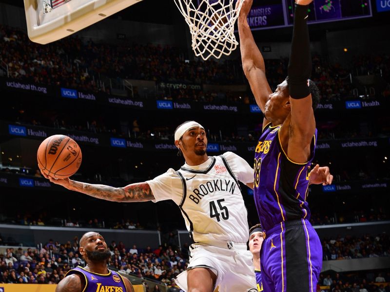 LOS ANGELES, CA - JANUARY 17: Keon Johnson #45 of the Brooklyn Nets passes the ball during the game against the Los Angeles Lakers on January 17, 2025 at Crypto.Com Arena in Los Angeles, California. NOTE TO USER: User expressly acknowledges and agrees that, by downloading and/or using this Photograph, user is consenting to the terms and conditions of the Getty Images License Agreement. Mandatory Copyright Notice: Copyright 2025 NBAE (Photo by Adam Pantozzi/NBAE via Getty Images)