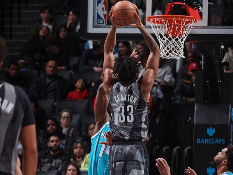 BROOKLYN, NY - FEBRUARY 10: Nicolas Claxton #33 of the Brooklyn Nets dunks the ball during the game against the Charlotte Hornets on February 10, 2025 at Barclays Center in Brooklyn, New York. NOTE TO USER: User expressly acknowledges and agrees that, by downloading and or using this Photograph, user is consenting to the terms and conditions of the Getty Images License Agreement. Mandatory Copyright Notice: Copyright 2025 NBAE (Photo by Nathaniel S. Butler/NBAE via Getty Images)