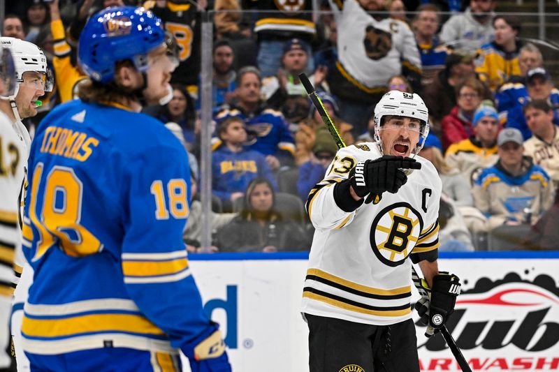 Jan 13, 2024; St. Louis, Missouri, USA;  Boston Bruins left wing Brad Marchand (63) reacts after scoring against the St. Louis Blues during the third period at Enterprise Center. Mandatory Credit: Jeff Curry-USA TODAY Sports