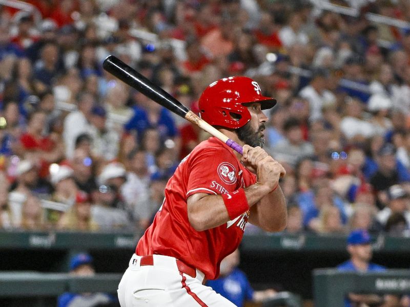 May 25, 2024; St. Louis, Missouri, USA;  St. Louis Cardinals pinch hitter Matt Carpenter (13) hits a one run single against the Chicago Cubs during the eighth inning  at Busch Stadium. Mandatory Credit: Jeff Curry-USA TODAY Sports