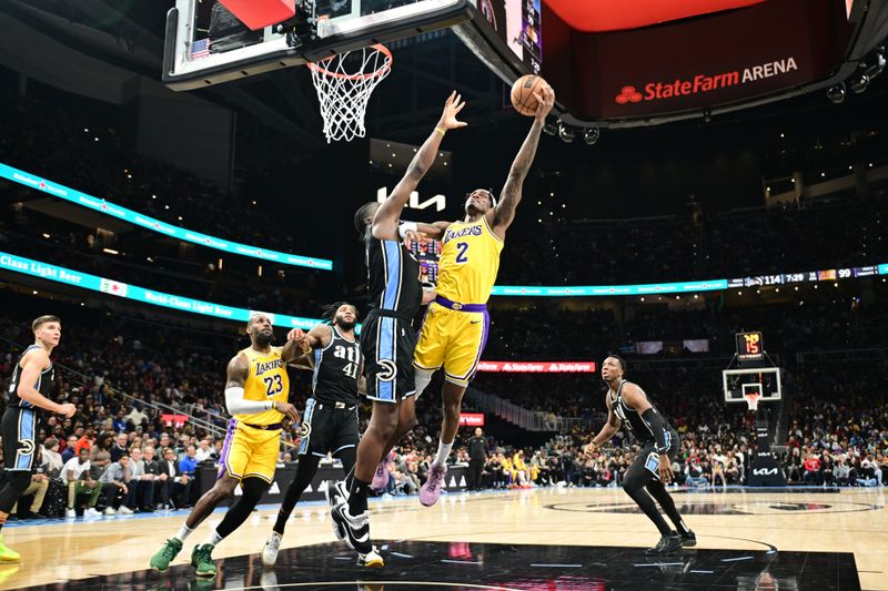 ATLANTA, GA - JANUARY 30: Jarred Vanderbilt #2 of the Los Angeles Lakers drives to the basket during the game  against the Atlanta Hawks on January 30, 2024 at State Farm Arena in Atlanta, Georgia.  NOTE TO USER: User expressly acknowledges and agrees that, by downloading and/or using this Photograph, user is consenting to the terms and conditions of the Getty Images License Agreement. Mandatory Copyright Notice: Copyright 2024 NBAE (Photo by Adam Hagy/NBAE via Getty Images)