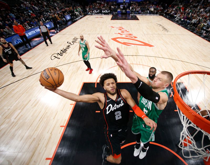 DETROIT, MI - MARCH 22: Cade Cunningham #2 of the Detroit Pistons drives to the basket during the game against the Boston Celtics on March 22, 2024 at Little Caesars Arena in Detroit, Michigan. NOTE TO USER: User expressly acknowledges and agrees that, by downloading and/or using this photograph, User is consenting to the terms and conditions of the Getty Images License Agreement. Mandatory Copyright Notice: Copyright 2024 NBAE (Photo by Brian Sevald/NBAE via Getty Images)