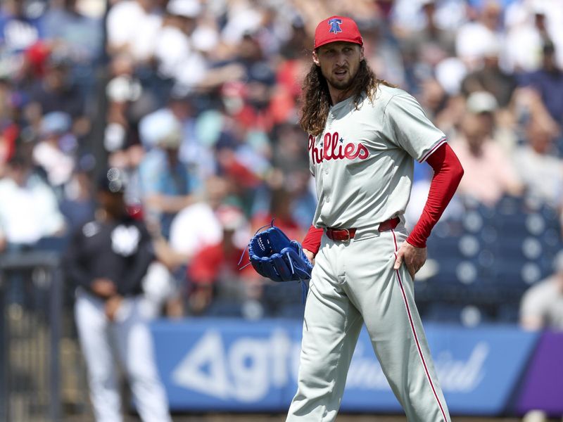 Mar 18, 2024; Tampa, Florida, USA;  Philadelphia Phillies relief pitcher Matt Strahm (25) reacts after a strikeout against the New York Yankees in the first inning at George M. Steinbrenner Field. Mandatory Credit: Nathan Ray Seebeck-USA TODAY Sports