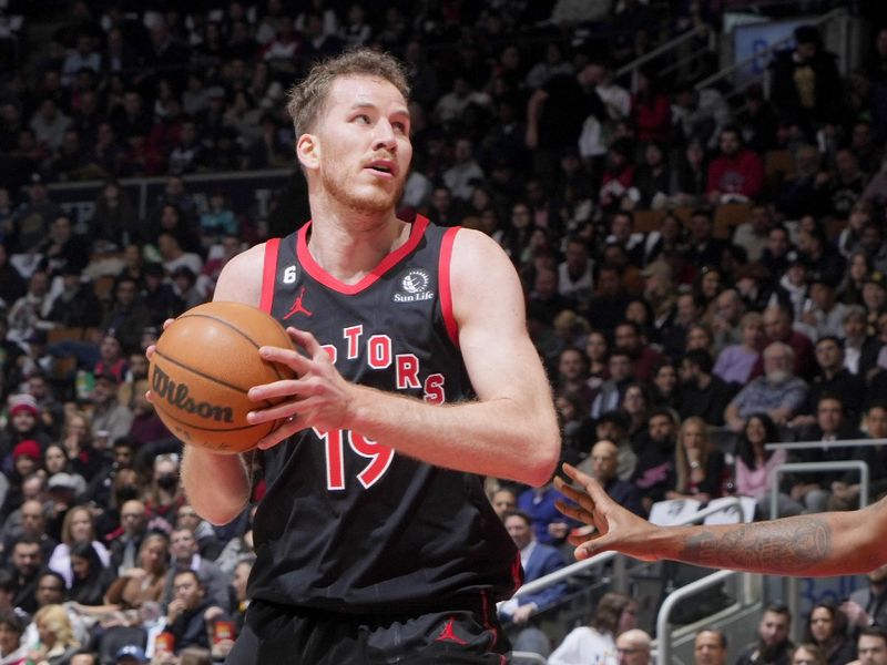 TORONTO, CANADA - FEBRUARY 23: Jakob Poeltl #19 of the Toronto Raptors handles the ball against the New Orleans Pelicans on February 23, 2023 at the Scotiabank Arena in Toronto, Ontario, Canada.  NOTE TO USER: User expressly acknowledges and agrees that, by downloading and or using this Photograph, user is consenting to the terms and conditions of the Getty Images License Agreement.  Mandatory Copyright Notice: Copyright 2023 NBAE (Photo by Mark Blinch/NBAE via Getty Images)