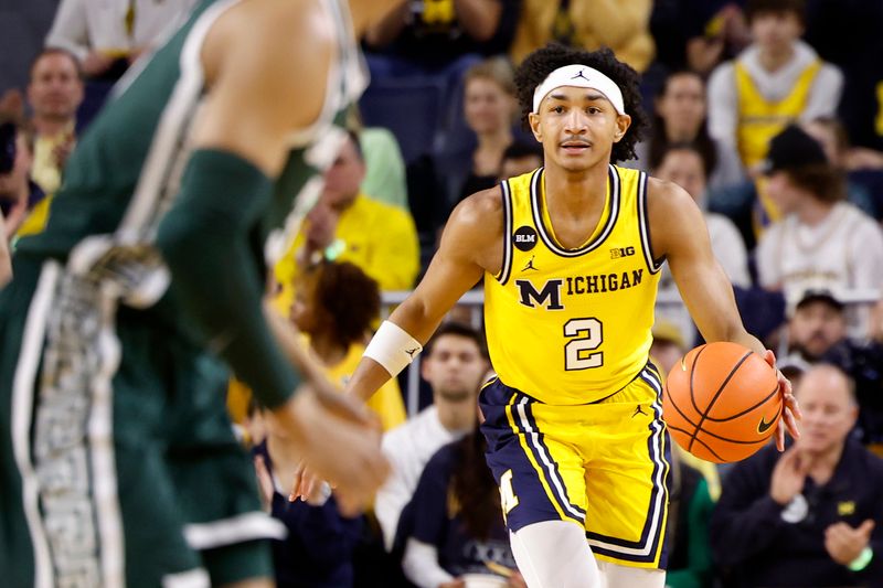 Feb 18, 2023; Ann Arbor, Michigan, USA;  Michigan Wolverines guard Kobe Bufkin (2) dribbles the ball against the Michigan State Spartans in the first half at Crisler Center. Mandatory Credit: Rick Osentoski-USA TODAY Sports