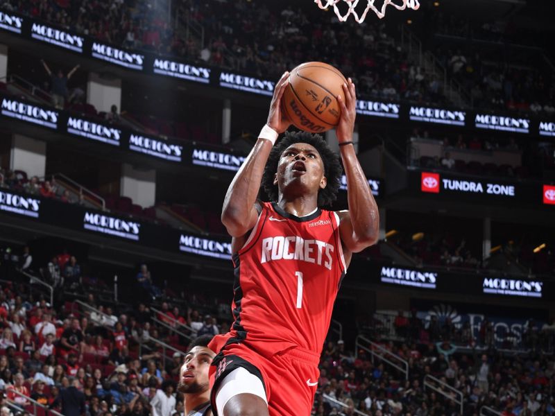 HOUSTON, TX - OCTOBER 25: Amen Thompson #1 of the Houston Rockets drives to the basket during the game against the Memphis Grizzlies on October 25, 2024 at the Toyota Center in Houston, Texas. NOTE TO USER: User expressly acknowledges and agrees that, by downloading and or using this photograph, User is consenting to the terms and conditions of the Getty Images License Agreement. Mandatory Copyright Notice: Copyright 2024 NBAE (Photo by Logan Riely/NBAE via Getty Images)