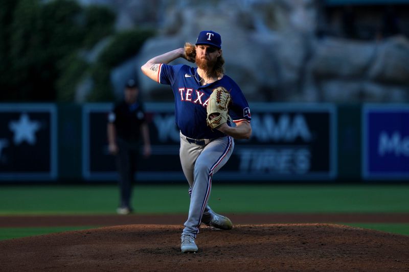 May 6, 2023; Anaheim, California, USA; Texas Rangers starting pitcher Jon Gray (22) throws in the third inning against the Los Angeles Angels at Angel Stadium. Mandatory Credit: Kirby Lee-USA TODAY Sports