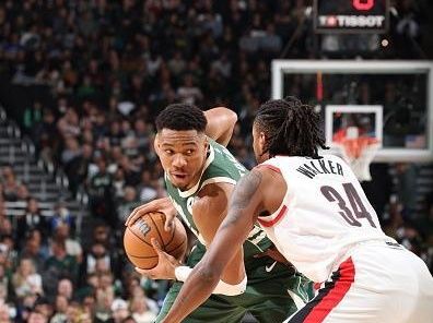 MILWAUKEE, WI - NOVEMBER 26: Giannis Antetokounmpo #34 of the Milwaukee Bucks handles the ball during the game against the Portland Trail Blazers on November 26, 2023 at the Fiserv Forum Center in Milwaukee, Wisconsin. NOTE TO USER: User expressly acknowledges and agrees that, by downloading and or using this Photograph, user is consenting to the terms and conditions of the Getty Images License Agreement. Mandatory Copyright Notice: Copyright 2023 NBAE (Photo by Jeff Haynes/NBAE via Getty Images).