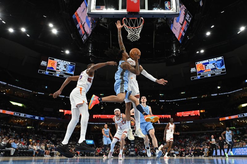 MEMPHIS, TN - FEBRUARY 25: Ja Morant #12 of the Memphis Grizzlies drives to the basket during the game against the Phoenix Suns on February 25, 2025 at FedExForum in Memphis, Tennessee. NOTE TO USER: User expressly acknowledges and agrees that, by downloading and or using this photograph, User is consenting to the terms and conditions of the Getty Images License Agreement. Mandatory Copyright Notice: Copyright 2025 NBAE(Photo by Grant Burke/NBAE via Getty Images)